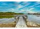 Stunning lake view from the pier, offering a peaceful escape with scenic vistas at 234 Rolling Woods Ct., Little River, SC 29566