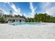 Expansive pool with ample seating and a charming pool house, perfect for community enjoyment at 234 Rolling Woods Ct., Little River, SC 29566