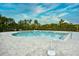 Inviting pool area with clear blue water and spacious brick patio, perfect for relaxation at 234 Rolling Woods Ct., Little River, SC 29566