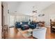 Inviting living room with a large sectional, high ceilings, and natural light at 2487 Windmill Way, Myrtle Beach, SC 29579
