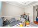 Cozy playroom features a play kitchen set and gray toddler sofa at 2487 Windmill Way, Myrtle Beach, SC 29579