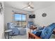 Cozy living room with ocean view, comfortable seating, and a ceiling fan for those hot summer days at 2710 S Ocean Blvd. # 402, Myrtle Beach, SC 29577