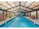 Relax in this beautiful indoor pool featuring ample seating and a transparent rooftop at 2710 S Ocean Blvd. # 402, Myrtle Beach, SC 29577