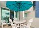 Cozy private patio with outdoor seating, ocean views, and a relaxing ambiance at 300 N Ocean Blvd. # 122, North Myrtle Beach, SC 29582