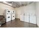 On-site laundry room with multiple washers, dryers, and a comfortable seating area at 300 N Ocean Blvd. # 122, North Myrtle Beach, SC 29582