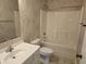 Bathroom featuring a vanity with a sink, toilet, and shower-tub combination with a white shower curtain at 300-J Myrtle Greens Dr. # J, Conway, SC 29526