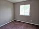 This bedroom offers natural light from a window and ample space, perfect for relaxation and personalization at 300-J Myrtle Greens Dr. # J, Conway, SC 29526