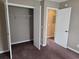 Bedroom with neutral paint, carpet, and closet featuring wire shelving at 300-J Myrtle Greens Dr. # J, Conway, SC 29526