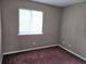 Cozy bedroom featuring neutral paint and a window for natural light at 300-J Myrtle Greens Dr. # J, Conway, SC 29526