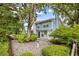 Charming two-story home features mature trees, well-maintained landscaping, and an inviting atmosphere at 308 76Th Ave. N # 5, Myrtle Beach, SC 29572