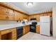 Kitchen features oak cabinets and modern appliances at 308 76Th Ave. N # 5, Myrtle Beach, SC 29572