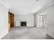 Living room with neutral color palette, built-in shelving unit and fireplace at 308 76Th Ave. N # 5, Myrtle Beach, SC 29572