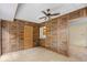 This living room has tiled flooring, a ceiling fan, and natural light at 308 76Th Ave. N # 5, Myrtle Beach, SC 29572