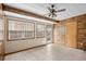 Sunroom features tiled floors, multiple windows, and a door leading outside at 308 76Th Ave. N # 5, Myrtle Beach, SC 29572