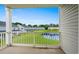 Balcony view overlooking lush green space and a pond creating a serene outdoor atmosphere at 340 Kiskadee Loop, Conway, SC 29526