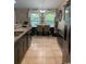 Well-designed kitchen with stainless steel appliances and a dining area with lots of natural light at 387 Blue Rock Dr., Longs, SC 29568