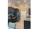 Efficient kitchen featuring dark cabinets, stainless steel appliances, and granite countertops at 387 Blue Rock Dr., Longs, SC 29568