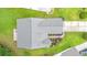 Aerial view of a home with a well-maintained roof, landscaping, and a paved driveway at 396 Mckendree Ln., Myrtle Beach, SC 29579