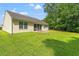 Expansive backyard featuring a well-maintained lawn, ideal for outdoor activities and relaxation at 396 Mckendree Ln., Myrtle Beach, SC 29579