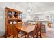 Formal dining room with hardwood floors, a chandelier, and a wooden hutch at 396 Mckendree Ln., Myrtle Beach, SC 29579