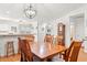 Formal dining room with wood table, overhead lighting, and hardwood floors at 396 Mckendree Ln., Myrtle Beach, SC 29579