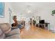 Open-concept living area with hardwood floors, natural light, and furniture at 396 Mckendree Ln., Myrtle Beach, SC 29579