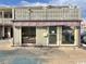 Commercial exterior with glass windows, advertising 'For Rent' on a sunny day at 403 6Th Ave. S, Myrtle Beach, SC 29577
