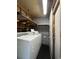 Laundry area with washer and dryer hookups and overhead storage shelving at 403 6Th Ave. S, Myrtle Beach, SC 29577
