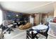 Cozy living room with gray wood floors, tv and casual seating at 403 6Th Ave. S, Myrtle Beach, SC 29577