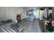 Living space with laminate floors, offering potential for customization and comfortable living at 403 6Th Ave. S, Myrtle Beach, SC 29577