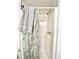 Simple shower stall with a shower curtain and visible hardware in a compact bathroom at 403 6Th Ave. S, Myrtle Beach, SC 29577