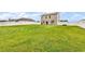 Expansive backyard with a well-maintained lawn and white privacy fence, ideal for recreation at 408 Carmello Circle, Conway, SC 29526