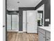 This bathroom features a walk-in shower, double closet, and neutral paint at 408 Carmello Circle, Conway, SC 29526
