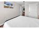 Bright bedroom featuring a queen bed, ceiling fan, and mounted TV at 408 Carmello Circle, Conway, SC 29526