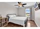 Bedroom with a queen bed, ceiling fan, TV, and view of the yard at 408 Carmello Circle, Conway, SC 29526