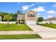 Charming two-story home featuring a well-manicured lawn and a classic neutral color palette at 408 Carmello Circle, Conway, SC 29526