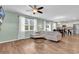 Inviting living area featuring an open layout seamlessly connecting to a modern kitchen and dining space at 408 Carmello Circle, Conway, SC 29526