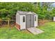 Charming backyard shed with a ramp, offering ample storage space and easy access at 408 Carmello Circle, Conway, SC 29526