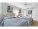 Comfortable bedroom featuring twin beds, neutral decor, and views of the en-suite bathroom at 4103 N Ocean Blvd. # 707, North Myrtle Beach, SC 29582