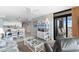 Open-concept living and dining area with ocean views, white furnishings, and coastal decor at 4103 N Ocean Blvd. # 707, North Myrtle Beach, SC 29582
