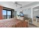 Serene main bedroom with balcony access, TV, dresser, cozy seating, and coastal decor at 4103 N Ocean Blvd. # 707, North Myrtle Beach, SC 29582