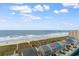 Gorgeous ocean view, complete with homes and a pier in the distance at 4103 N Ocean Blvd. # 707, North Myrtle Beach, SC 29582