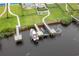 Aerial view of a private dock and boat lift on the river behind the home at 433 Saint Julian Ln., Myrtle Beach, SC 29579