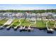 An aerial view of the backyards, each featuring unique in-ground pool, and a dock on the river at 433 Saint Julian Ln., Myrtle Beach, SC 29579
