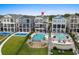 An aerial view of the well-appointed homes, each featuring a unique in-ground pool and outdoor living area at 433 Saint Julian Ln., Myrtle Beach, SC 29579
