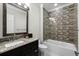 Stylish bathroom with dark wood vanity, granite countertop, and tiled shower and tub at 433 Saint Julian Ln., Myrtle Beach, SC 29579