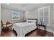 Cozy bedroom with hardwood floors, ceiling fan, and natural light at 433 Saint Julian Ln., Myrtle Beach, SC 29579