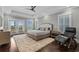 Tranquil main bedroom with private balcony, plush carpet, and natural light pouring in at 433 Saint Julian Ln., Myrtle Beach, SC 29579
