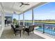 Outdoor patio with a scenic water view, comfortable seating, and a ceiling fan for relaxing at 433 Saint Julian Ln., Myrtle Beach, SC 29579