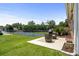 Backyard featuring a tennis court and a comfortable patio area for outdoor relaxation at 4648 Lightkeepers Way # 39A, Little River, SC 29566